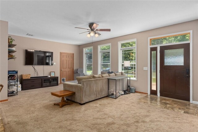485 County Road 600 N, Neoga, IL 62447 - living room with ceiling fan, plenty of natural light, and carpet flooring
