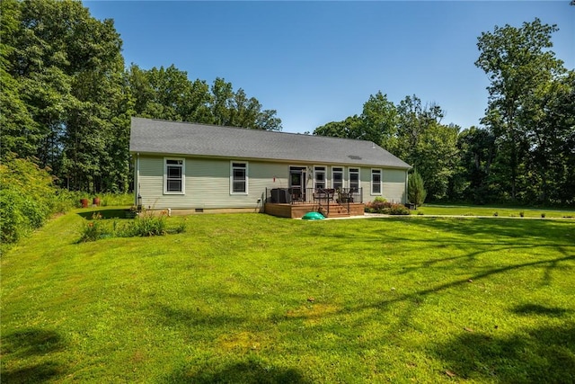 485 County Road 600 N, Neoga, IL 62447 - back of house featuring a lawn and a deck
