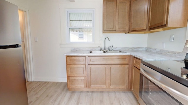 2198 Hendrix St, Decatur, IL 62521 - kitchen with appliances with stainless steel finishes and light wood finished floors