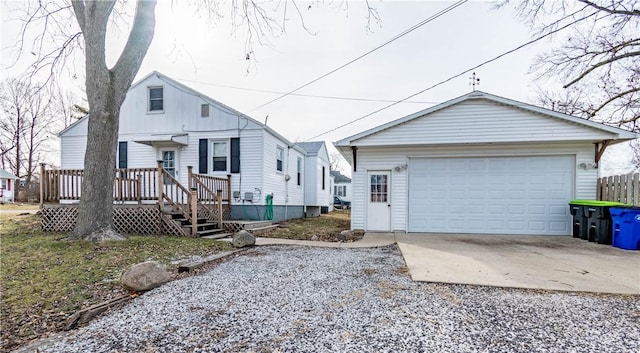 view of front of home with an outbuilding and a garage