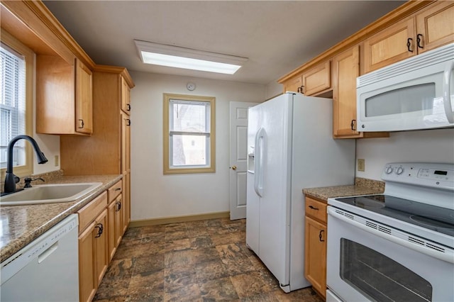 kitchen with white appliances and sink