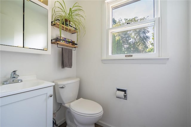1203 Temple Ave, Effingham, IL 62401 - half bathroom featuring vanity and toilet