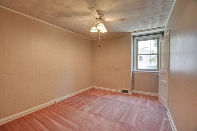 164 S Linden Ave, Decatur, IL 62522 - unfurnished room featuring light colored carpet, a ceiling fan, crown molding, and baseboards