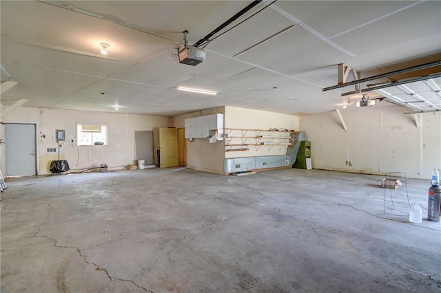 319 N Macon St, Moweaqua, IL 62550 - garage featuring a garage door opener