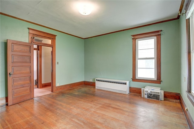 319 N Macon St, Moweaqua, IL 62550 - unfurnished room with crown molding and wood finished floors