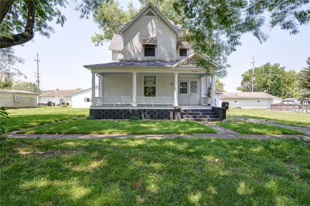 319 N Macon St, Moweaqua, IL 62550 - view of front facade featuring a porch
