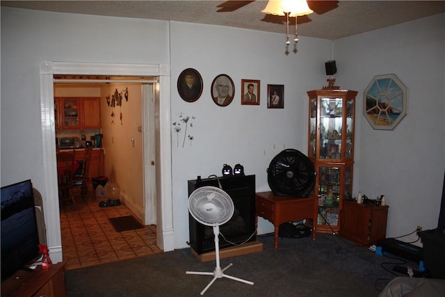 235 E 150 N Rd, Hammond, IL 61929 - living area with a ceiling fan and tile patterned flooring