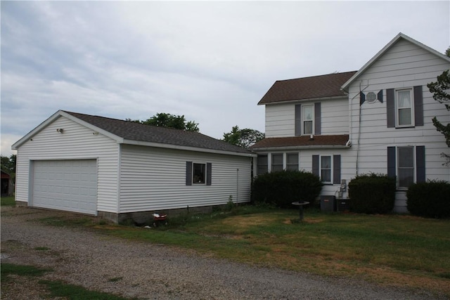 235 E 150 N Rd, Hammond, IL 61929 - view of front of property with driveway, an outdoor structure, and a shingled roof