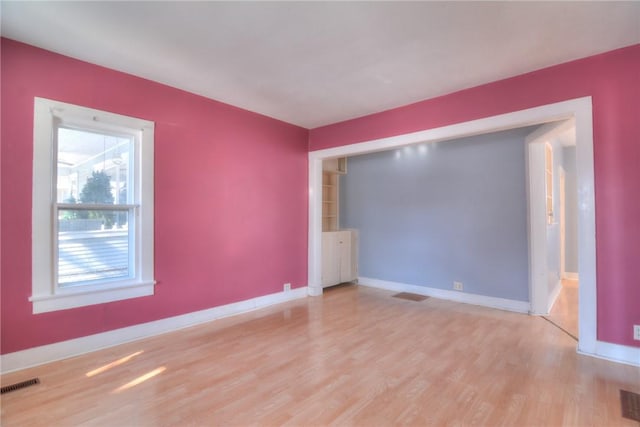 empty room featuring light hardwood / wood-style floors