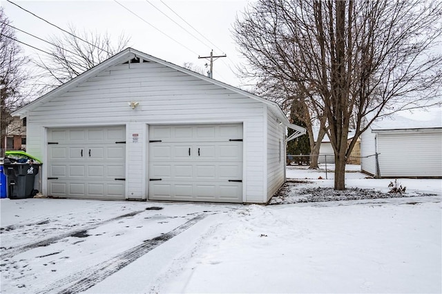 view of snow covered garage