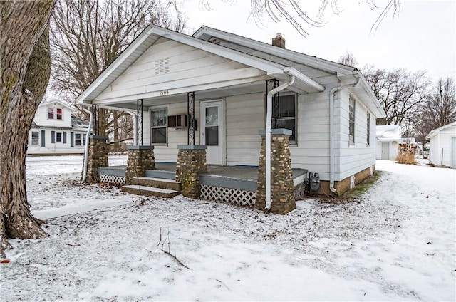 bungalow-style home with covered porch