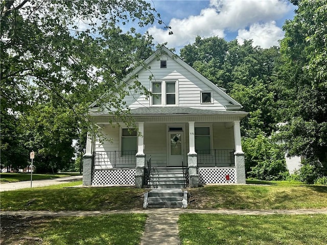 996 W Packard St, Decatur, IL 62522 - view of front of property with covered porch and a front lawn