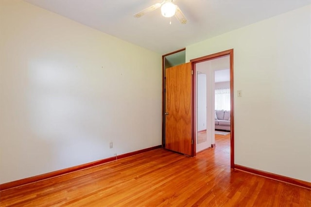 2417 Maple Ave, Decatur, IL 62526 - spare room featuring light wood-style floors and ceiling fan
