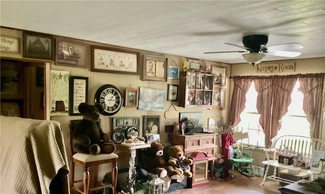 interior space featuring ceiling fan