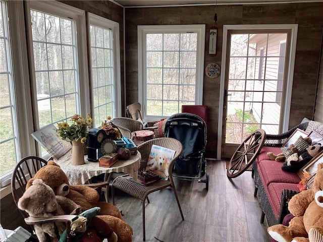 sunroom / solarium featuring plenty of natural light