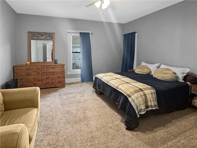 bedroom featuring carpet flooring and a ceiling fan