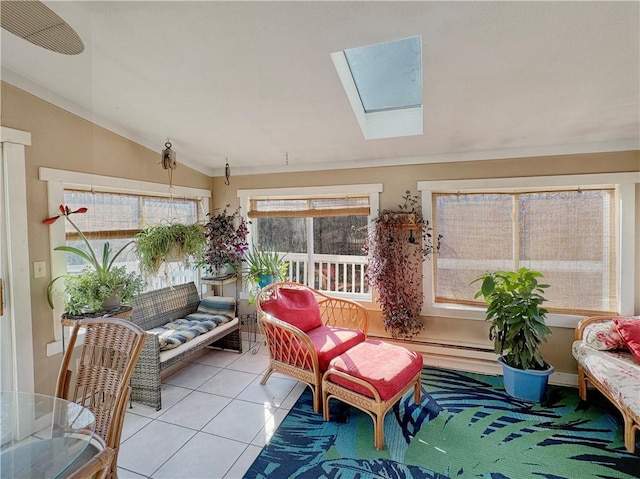 sunroom / solarium with lofted ceiling with skylight and baseboard heating