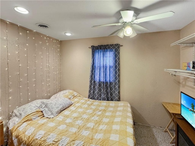 bedroom featuring visible vents, a ceiling fan, and recessed lighting