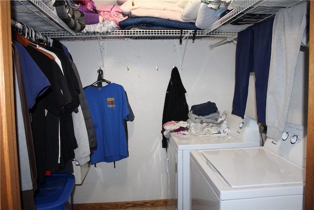 laundry room featuring washer and clothes dryer