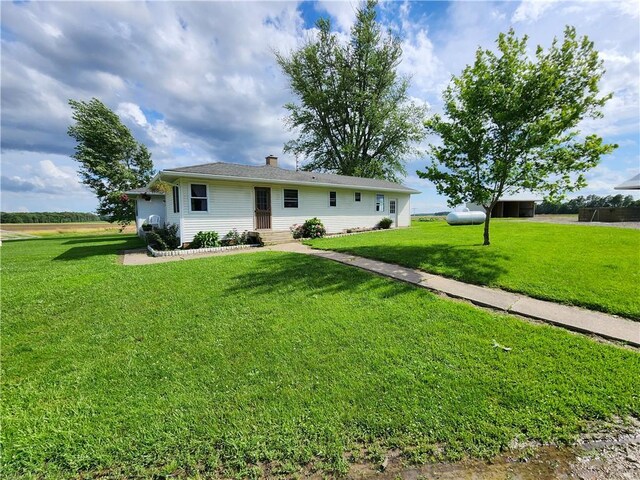 17204 N 125th St, Oblong, IL 62449 - ranch-style house featuring a front yard and a chimney