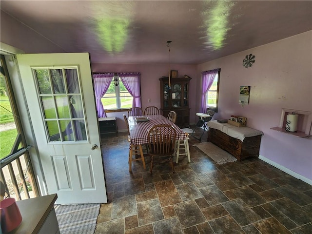 17204 N 125th St, Oblong, IL 62449 - dining room featuring baseboards and stone tile flooring