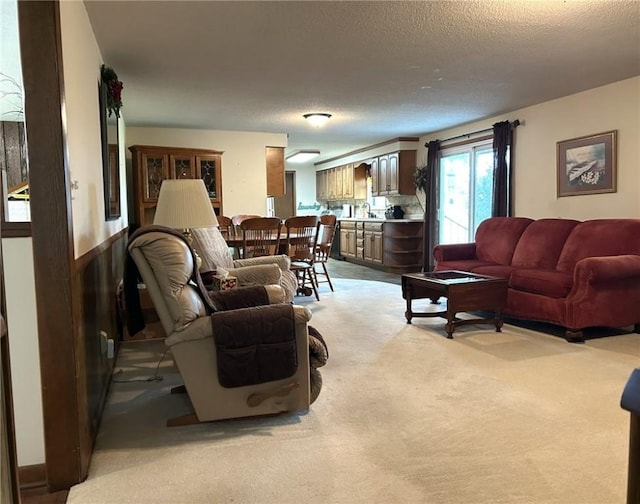 601 Holiday Dr, Effingham, IL 62401 - living room with light colored carpet and a textured ceiling