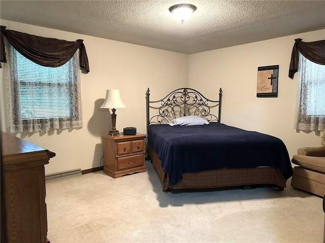 601 Holiday Dr, Effingham, IL 62401 - bedroom featuring light colored carpet and a textured ceiling