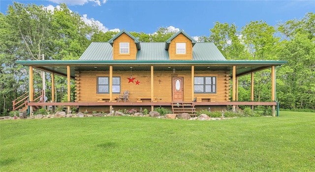 9092 N County Road 2150 E, Ashmore, IL 61912 - log home with a porch, log exterior, a front yard, and metal roof