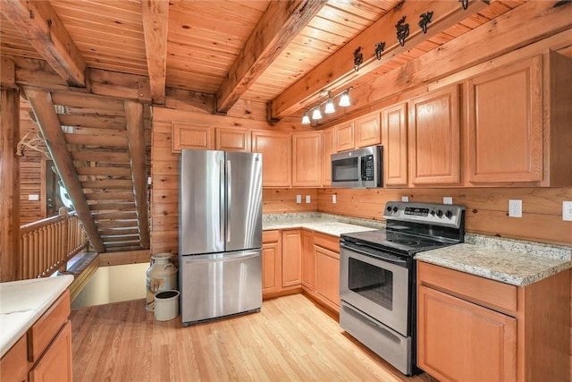 9092 N County Road 2150 E, Ashmore, IL 61912 - kitchen featuring stainless steel appliances, light brown cabinetry, light wood-type flooring, wooden ceiling with exposed beams, and light stone countertops