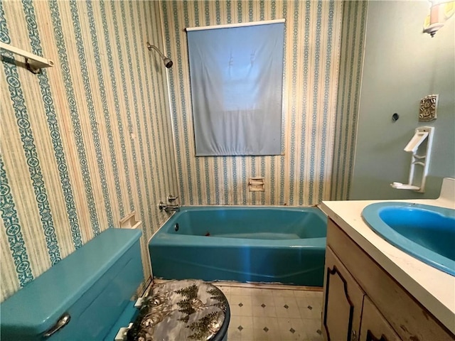 bathroom featuring a bathing tub and vanity