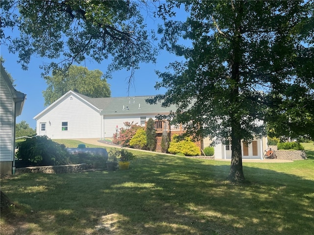 view of yard featuring a wooden deck