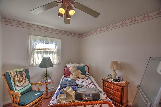 4111 Dye Rd, Illiopolis, IL 62539 - carpeted bedroom with a ceiling fan and baseboards