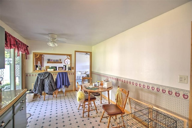 4111 Dye Rd, Illiopolis, IL 62539 - dining area featuring wainscoting and a ceiling fan