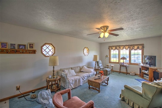 4111 Dye Rd, Illiopolis, IL 62539 - carpeted living room with a textured ceiling and ceiling fan