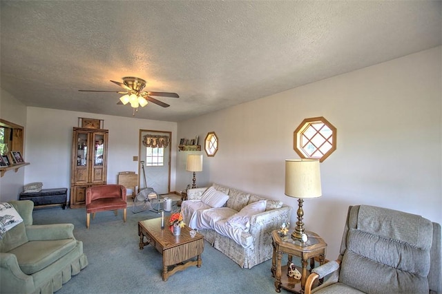 4111 Dye Rd, Illiopolis, IL 62539 - carpeted living area featuring a textured ceiling and ceiling fan