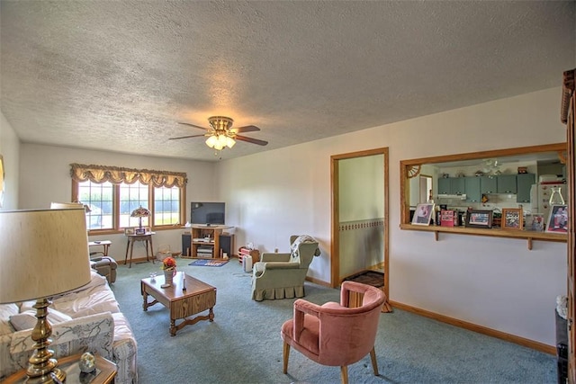 4111 Dye Rd, Illiopolis, IL 62539 - living area featuring a textured ceiling, ceiling fan, and carpet floors