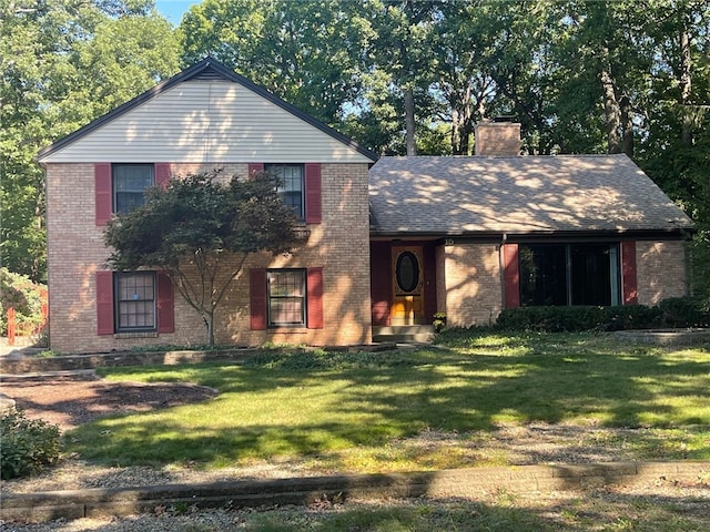 view of front of property with a front lawn