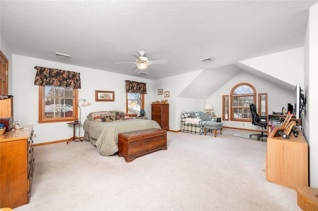 2 Rosewood Ct, Paris, IL 61944 - bedroom with a textured ceiling, light colored carpet, vaulted ceiling, and ceiling fan