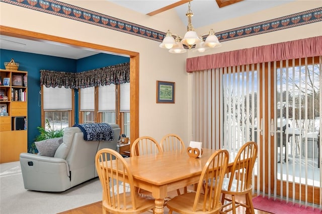 2 Rosewood Ct, Paris, IL 61944 - dining space featuring hardwood / wood-style floors and an inviting chandelier