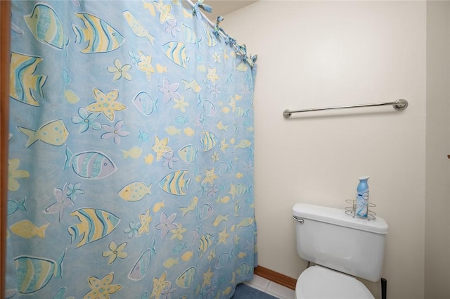 2 Rosewood Ct, Paris, IL 61944 - bathroom with tile patterned floors, toilet, and walk in shower