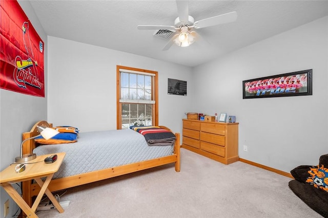 2 Rosewood Ct, Paris, IL 61944 - carpeted bedroom with a textured ceiling and ceiling fan