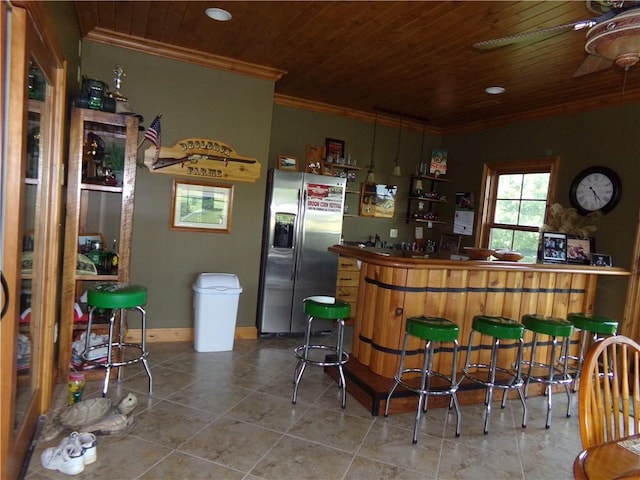 2277 County Highway 3, Findlay, IL 62534 - indoor dry bar featuring stainless steel refrigerator with ice dispenser, wooden ceiling, ornamental molding, tile patterned flooring, and ceiling fan