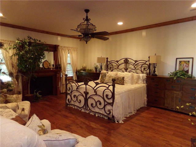 2277 County Highway 3, Findlay, IL 62534 - bedroom with wood finished floors, ornamental molding, a fireplace, recessed lighting, and ceiling fan