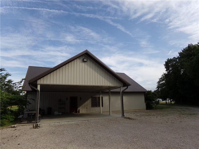 2277 County Highway 3, Findlay, IL 62534 - view of front of house with a metal roof, gravel driveway, and a carport