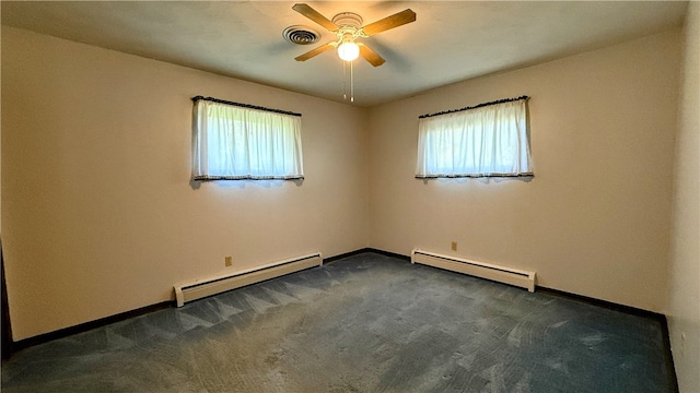 carpeted empty room with ceiling fan and a baseboard radiator