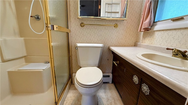 bathroom with vanity, tile patterned flooring, toilet, a baseboard radiator, and an enclosed shower