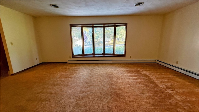 carpeted spare room with a textured ceiling