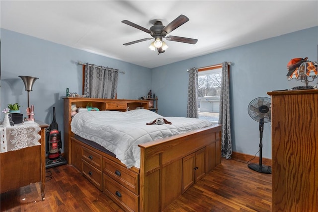 bedroom with dark wood-style floors, baseboards, and a ceiling fan