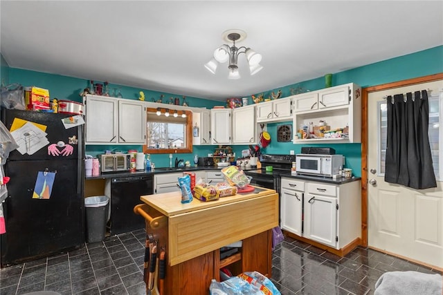 kitchen featuring white cabinetry, open shelves, black appliances, and dark countertops