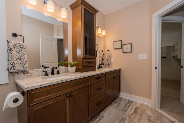 bathroom with dual bowl vanity